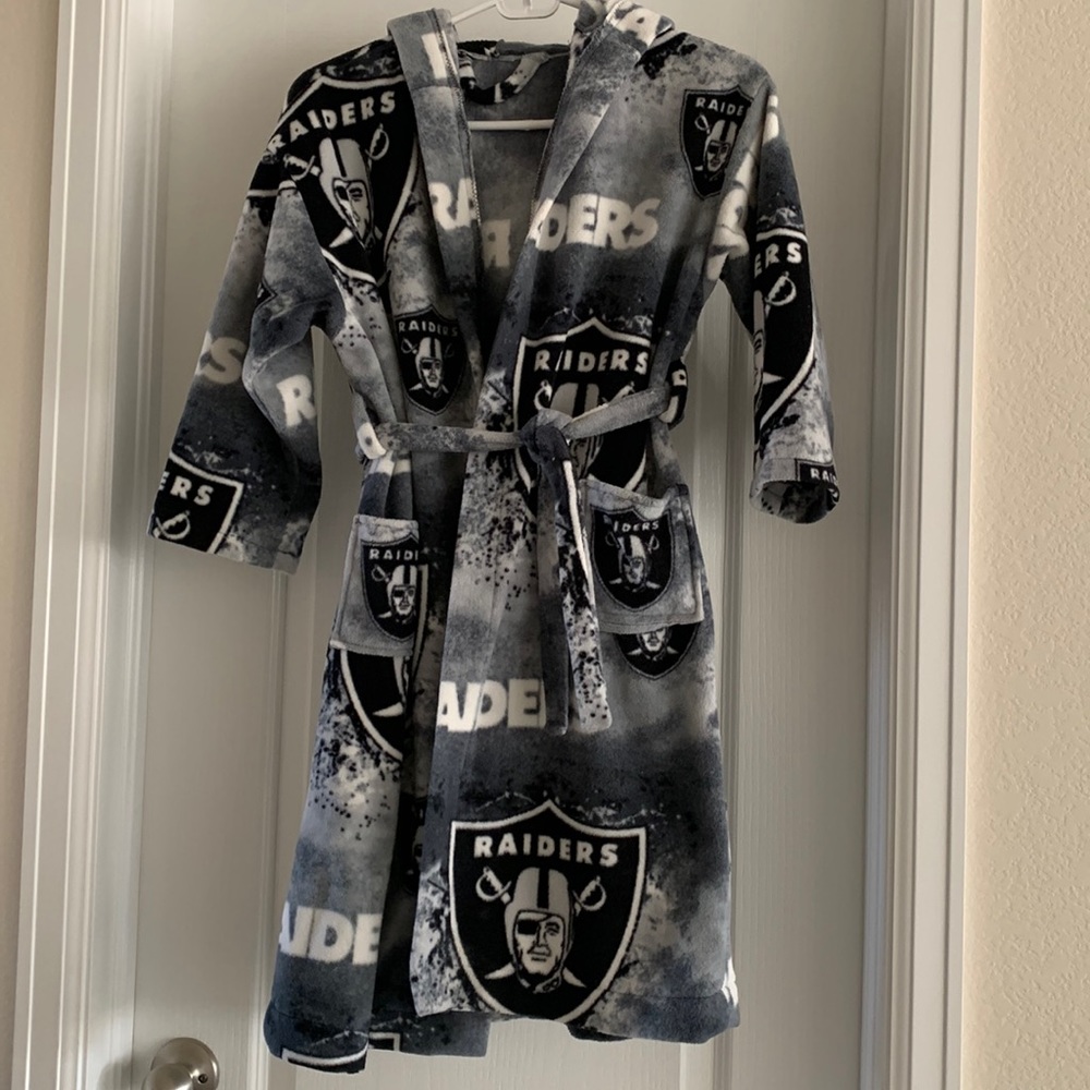 Handmade fleece Raiders bathrobe. Size is approx. youth 8-10. Great condition.